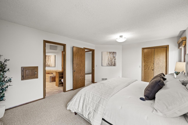 1306 Wynridge Dr, Arden Hills, MN 55112 - carpeted bedroom with a textured ceiling and ensuite bathroom