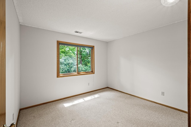 1306 Wynridge Dr, Arden Hills, MN 55112 - carpeted spare room with baseboards and a textured ceiling