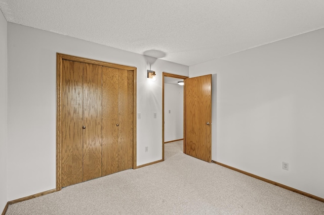 1306 Wynridge Dr, Arden Hills, MN 55112 - unfurnished bedroom with carpet, a closet, and a textured ceiling