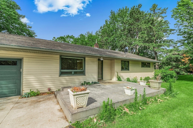 5848 16th Ave SE, Haven Twp, MN 56304 - rear view of house with a patio and a yard