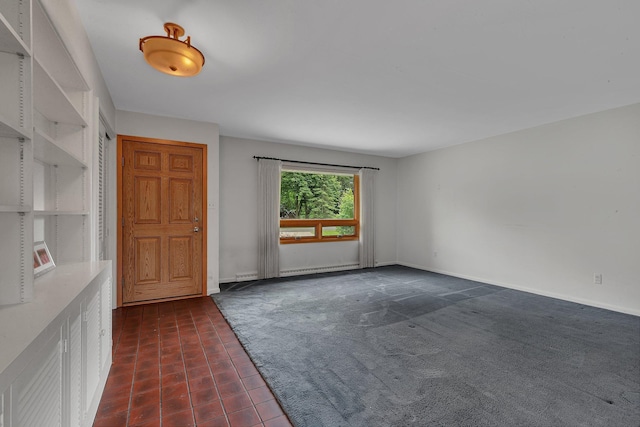 5848 16th Ave SE, Haven Twp, MN 56304 - spare room with dark tile patterned flooring and dark colored carpet