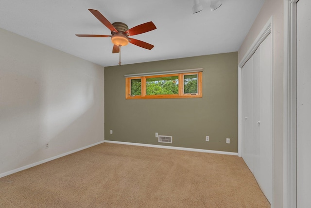 5848 16th Ave SE, Haven Twp, MN 56304 - unfurnished bedroom featuring carpet floors, a closet, and ceiling fan