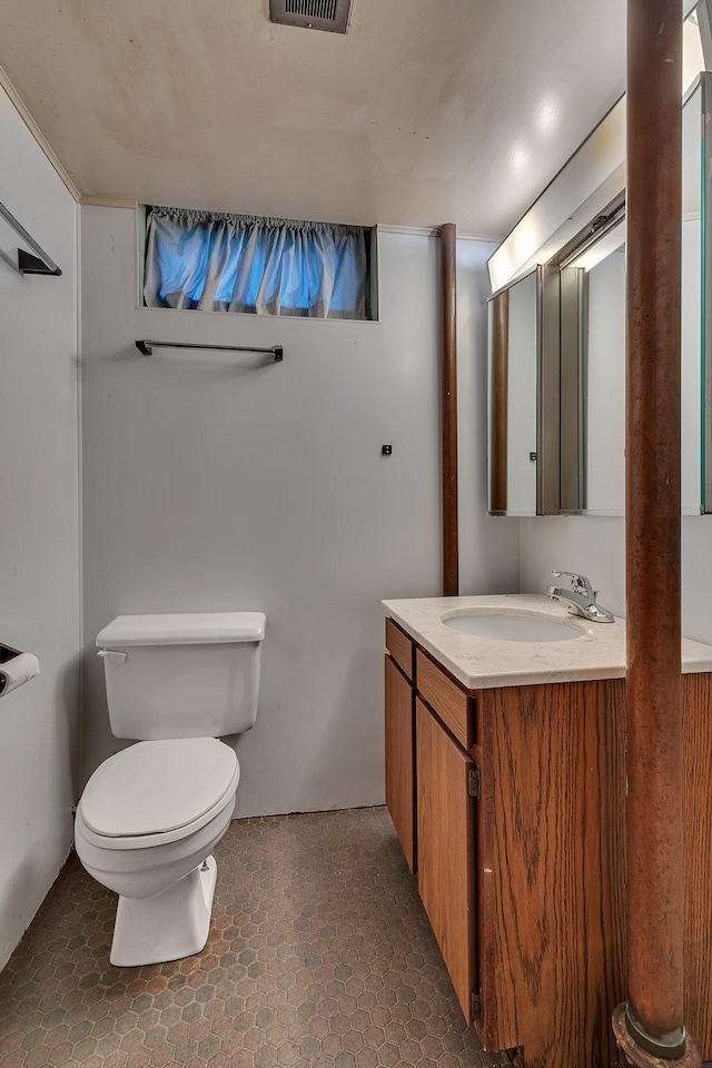 5848 16th Ave SE, Haven Twp, MN 56304 - bathroom with vanity and toilet