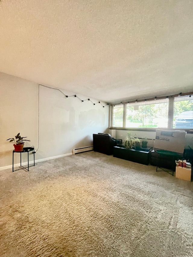4010 15th Ave S Unit 6D, Minneapolis, MN 55407 - living room featuring baseboard heating, a textured ceiling, and carpet floors