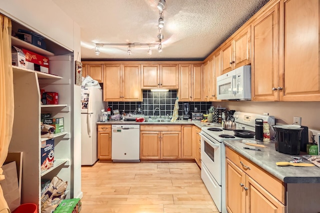 4010 15th Ave S Unit 6D, Minneapolis, MN 55407 - kitchen featuring white appliances, light wood finished floors, backsplash, open shelves, and light brown cabinetry