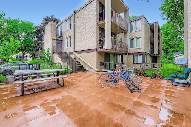 4010 15th Ave S Unit 6D, Minneapolis, MN 55407 - view of patio featuring stairway