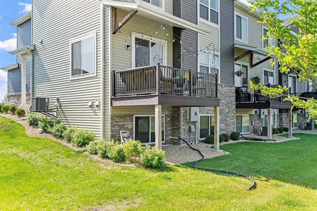 14811 Willemite St NW, Ramsey, MN 55303 - back of property with stone siding and a yard