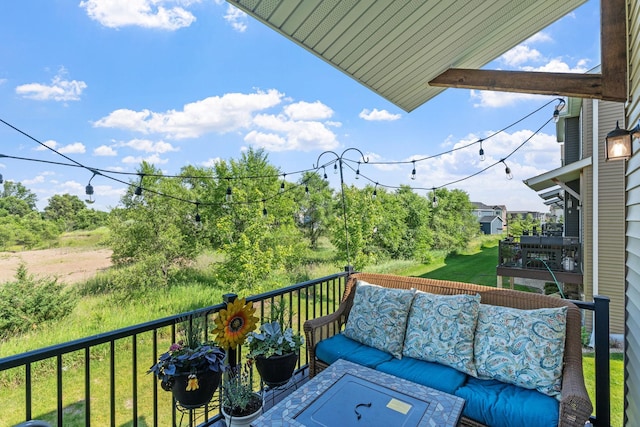 14811 Willemite St NW, Ramsey, MN 55303 - balcony featuring outdoor lounge area