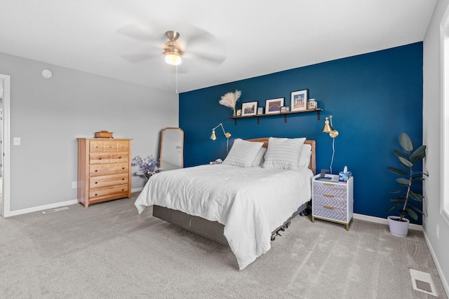 14811 Willemite St NW, Ramsey, MN 55303 - carpeted bedroom with a ceiling fan and baseboards