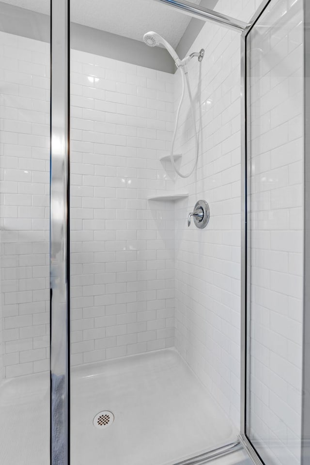 14811 Willemite St NW, Ramsey, MN 55303 - bathroom featuring a stall shower