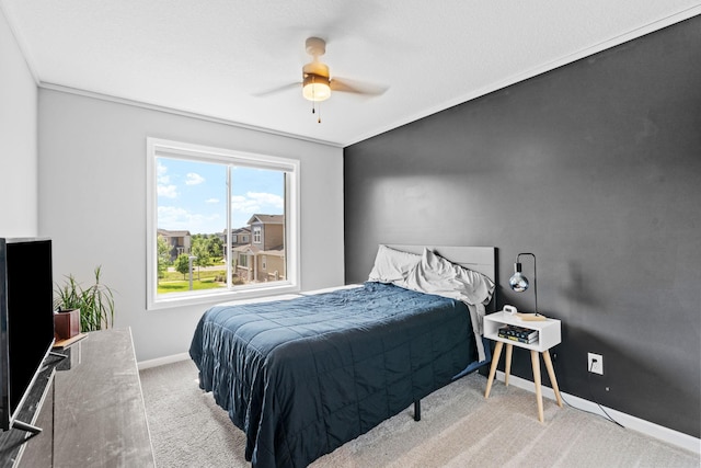 14811 Willemite St NW, Ramsey, MN 55303 - carpeted bedroom with baseboards and a ceiling fan