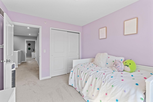 14811 Willemite St NW, Ramsey, MN 55303 - bedroom featuring light colored carpet, a closet, and recessed lighting
