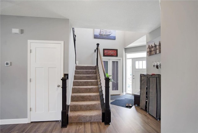 14385 Annapolis Ln N, Dayton, MN 55327 - entryway featuring wood finished floors and stairs