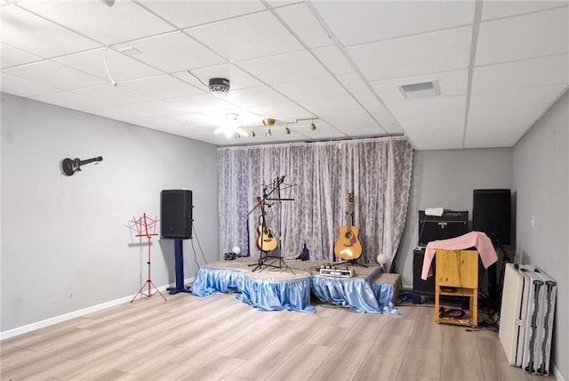 14385 Annapolis Ln N, Dayton, MN 55327 - bedroom featuring wood finished floors and a paneled ceiling