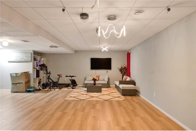 14385 Annapolis Ln N, Dayton, MN 55327 - workout room featuring wood finished floors and a drop ceiling