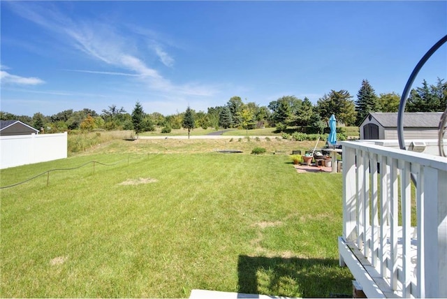 14385 Annapolis Ln N, Dayton, MN 55327 - view of yard featuring a storage shed and view of wooded area