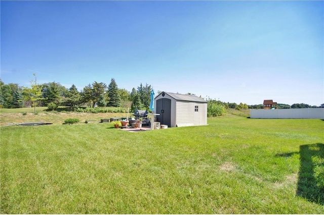 14385 Annapolis Ln N, Dayton, MN 55327 - view of yard with a storage unit and a patio