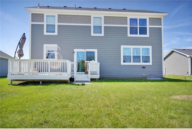 14385 Annapolis Ln N, Dayton, MN 55327 - back of property with a wooden deck and a lawn