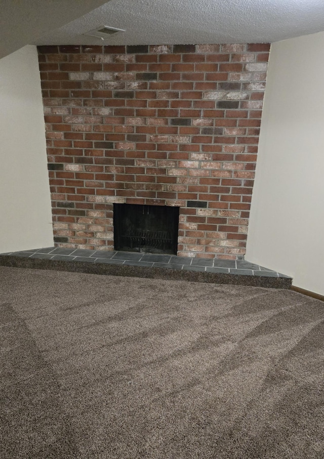 16660 Garland Way W, Lakeville, MN 55068 - detailed view of a fireplace, carpet floors, and a textured ceiling