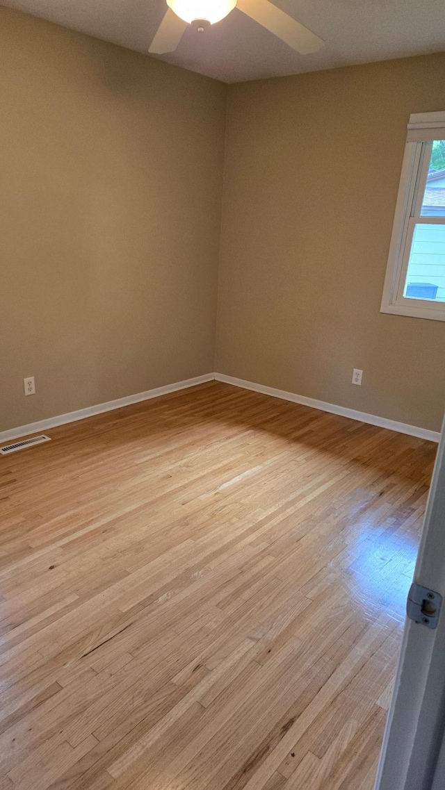 16660 Garland Way W, Lakeville, MN 55068 - spare room with a ceiling fan and light wood finished floors