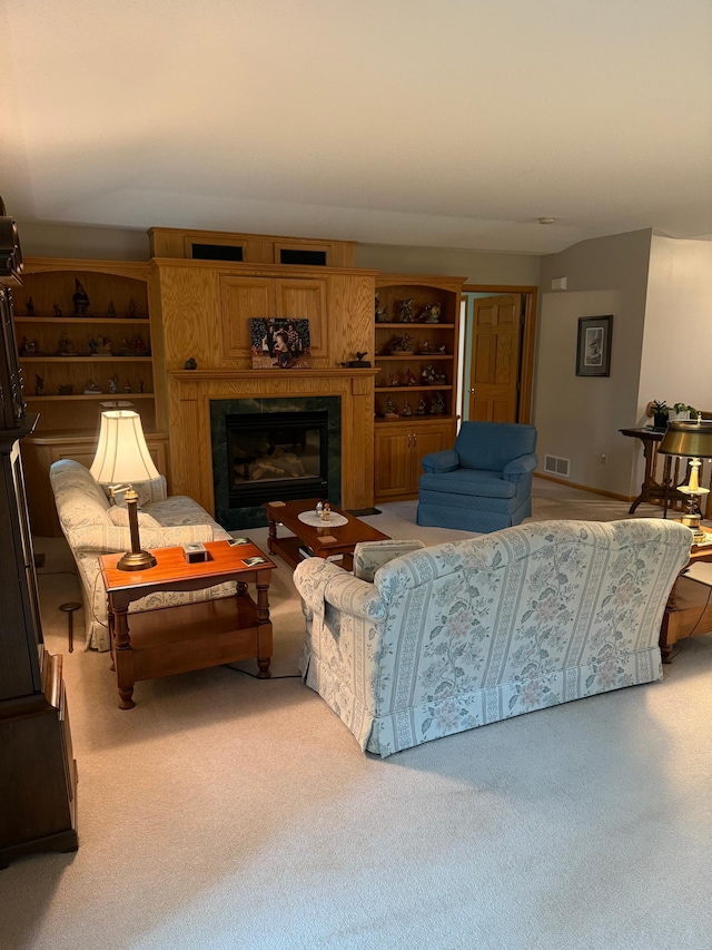 527 Woodside Ct, Shakopee, MN 55379 - living room featuring light colored carpet and a glass covered fireplace