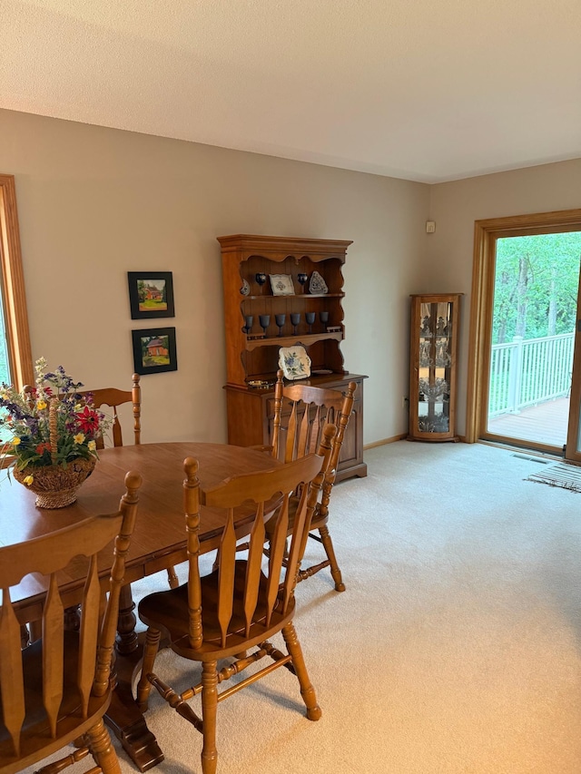 527 Woodside Ct, Shakopee, MN 55379 - dining area featuring light colored carpet