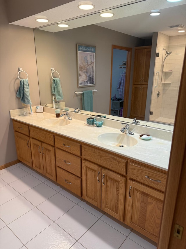 527 Woodside Ct, Shakopee, MN 55379 - bathroom with double vanity, tile patterned floors, a shower stall, and recessed lighting