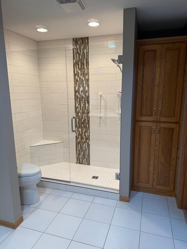 527 Woodside Ct, Shakopee, MN 55379 - bathroom featuring a stall shower, tile patterned flooring, and recessed lighting