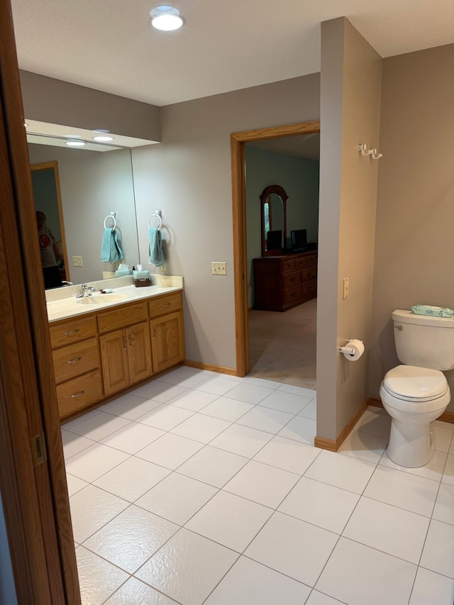 527 Woodside Ct, Shakopee, MN 55379 - bathroom featuring vanity, tile patterned flooring, and recessed lighting