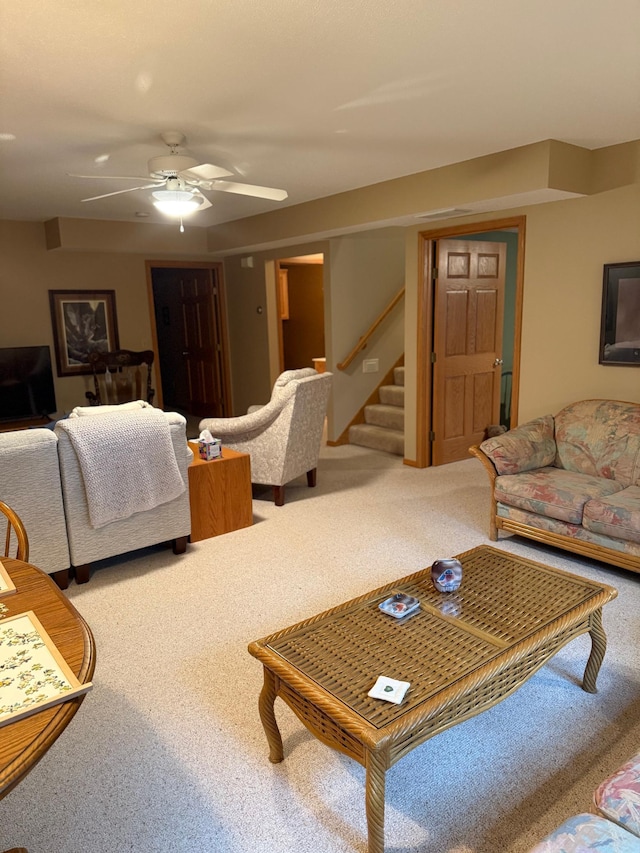 527 Woodside Ct, Shakopee, MN 55379 - living room with carpet flooring, stairway, and a ceiling fan