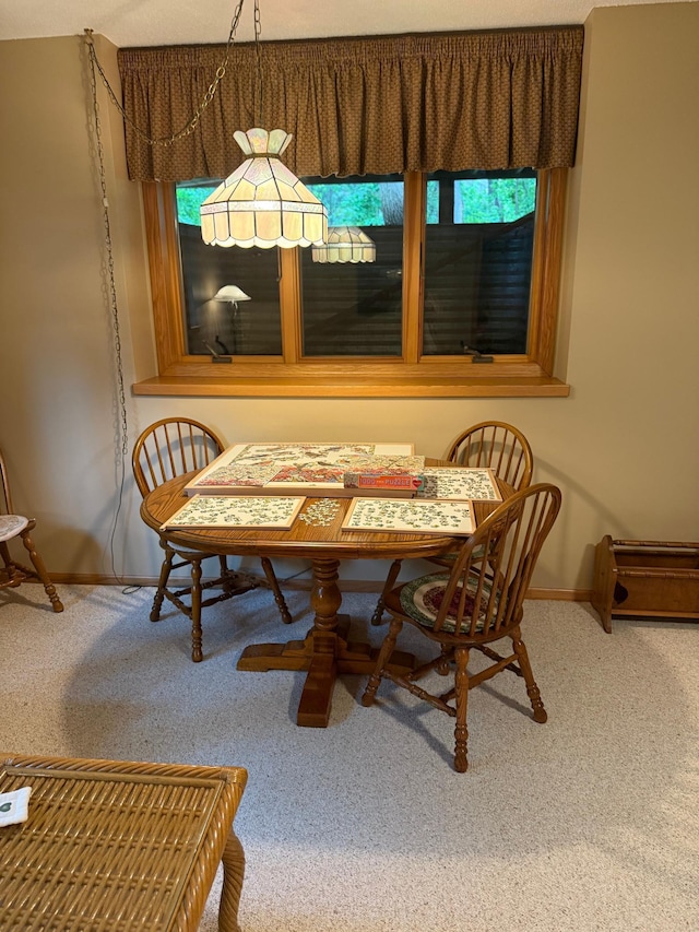 527 Woodside Ct, Shakopee, MN 55379 - dining area with carpet flooring and baseboards