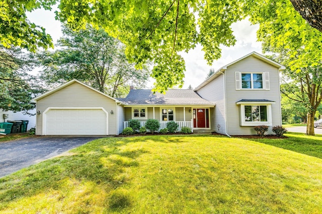 5577 Alameda St, Shoreview, MN 55126 - traditional home with driveway, a front yard, an attached garage, covered porch, and roof with shingles