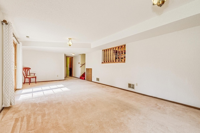 5577 Alameda St, Shoreview, MN 55126 - carpeted spare room with stairway and baseboards