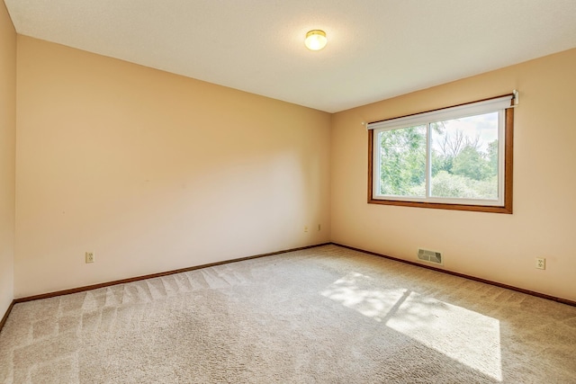 5577 Alameda St, Shoreview, MN 55126 - carpeted empty room featuring baseboards