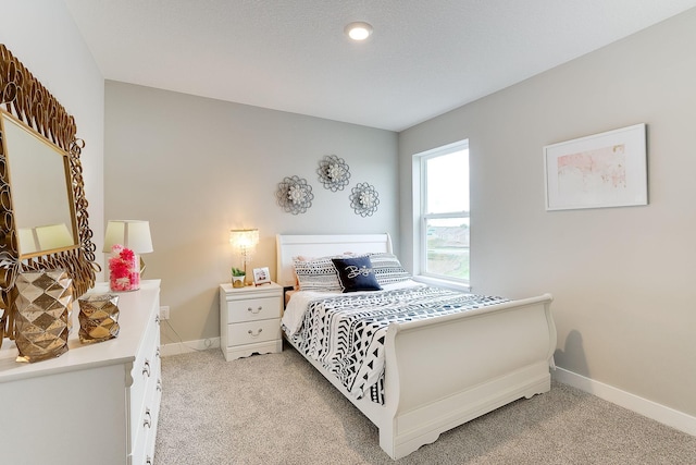12577 Marshview Dr, Rogers, MN 55374 - bedroom with light colored carpet and baseboards