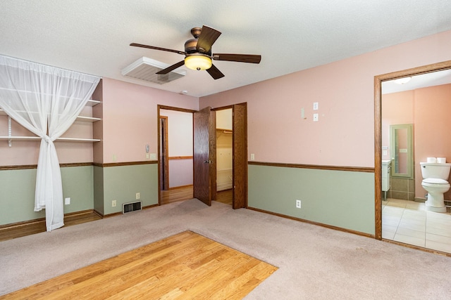 9533 Chicago Ave S, Bloomington, MN 55420 - unfurnished bedroom with carpet, ensuite bathroom, and a ceiling fan