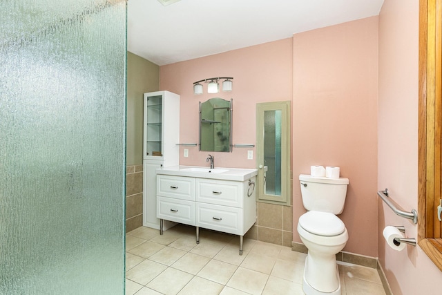 9533 Chicago Ave S, Bloomington, MN 55420 - full bath featuring tile patterned floors, vanity, tile walls, and wainscoting