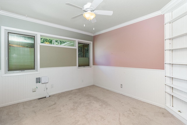 9533 Chicago Ave S, Bloomington, MN 55420 - carpeted empty room featuring a wainscoted wall, ceiling fan, and ornamental molding
