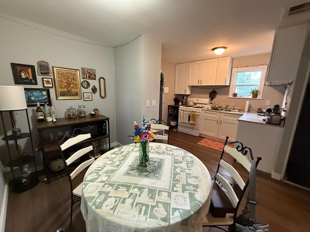 4520 Nicollet Ave, Minneapolis, MN 55419 - dining space featuring dark wood-type flooring