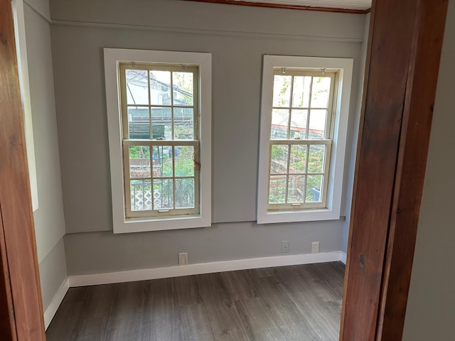 4520 Nicollet Ave, Minneapolis, MN 55419 - spare room featuring baseboards and dark wood-style floors