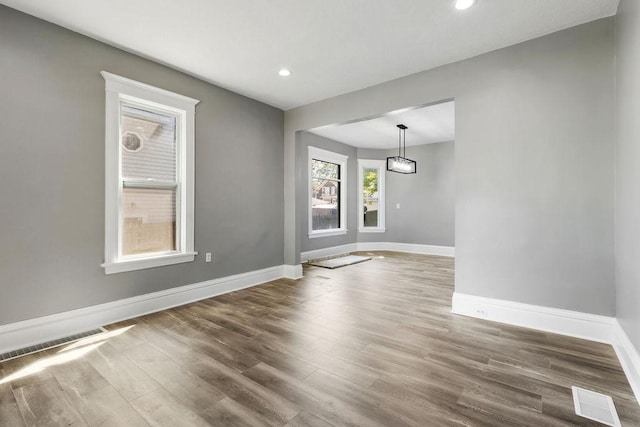 2815 Girard Ave N, Minneapolis, MN 55411 - empty room featuring wood finished floors and recessed lighting
