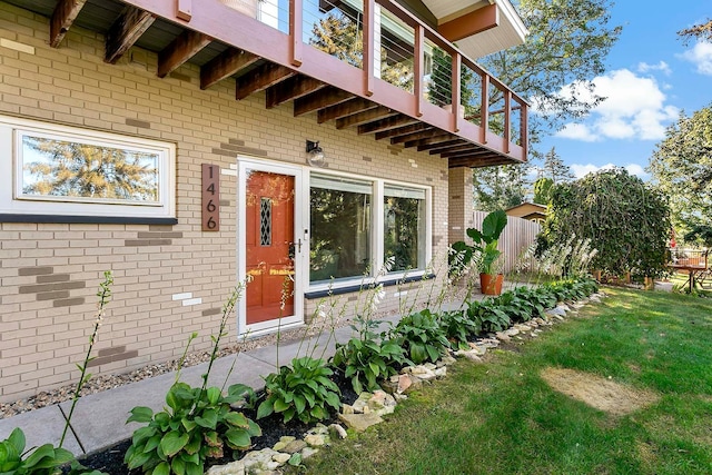 1466 Highview Ave, Eagan, MN 55121 - doorway to property featuring brick siding and a balcony