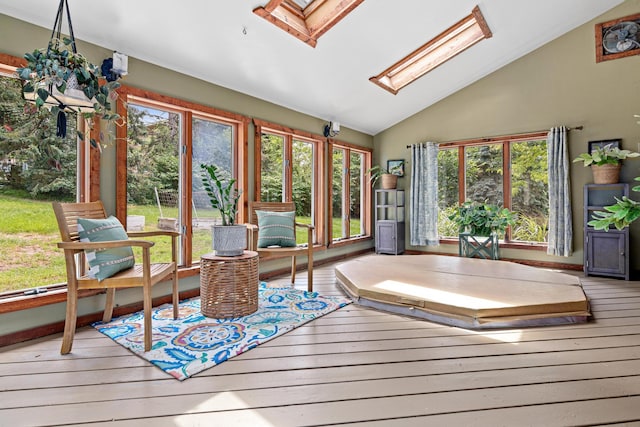 1466 Highview Ave, Eagan, MN 55121 - sunroom with a skylight, vaulted ceiling, a deck, and wood-type flooring