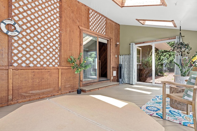 1466 Highview Ave, Eagan, MN 55121 - unfurnished sunroom featuring a skylight and lofted ceiling