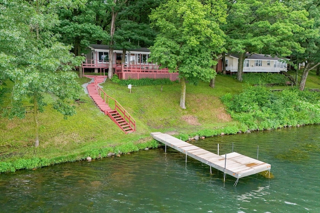 1625 Niles Ln, Balsam Lake Twp, WI 54824 - dock area featuring a water view, stairs, and a wooded view
