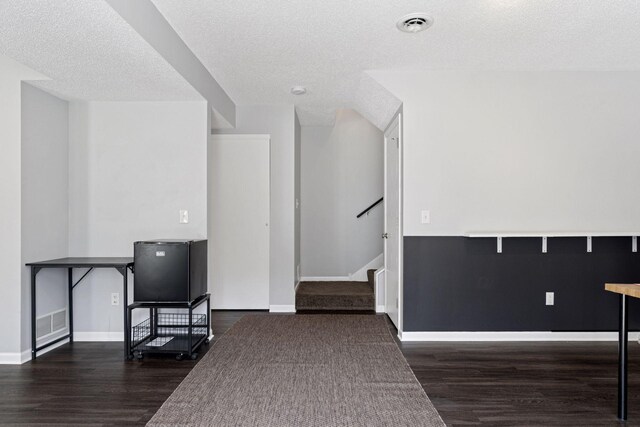 6845 Christian Curv, Woodbury, MN 55125 - interior space with wood finished floors, stairway, and a textured ceiling
