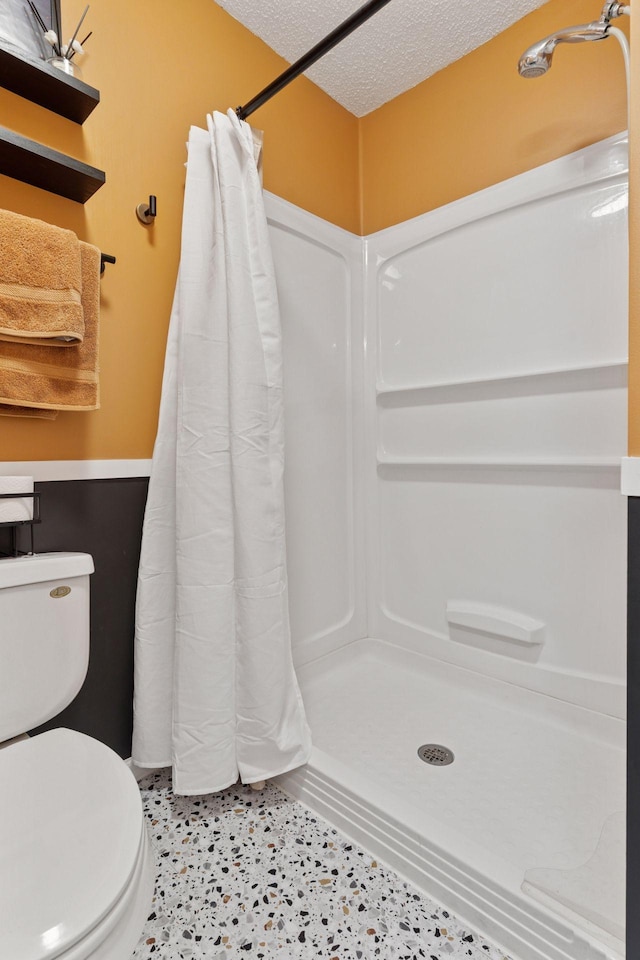 6845 Christian Curv, Woodbury, MN 55125 - bathroom with a textured ceiling and a shower with shower curtain