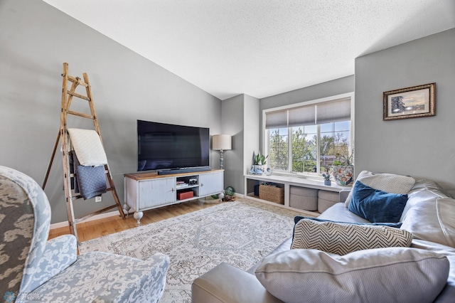 1623 10th St W, West Fargo, ND 58078 - living room featuring wood finished floors and lofted ceiling