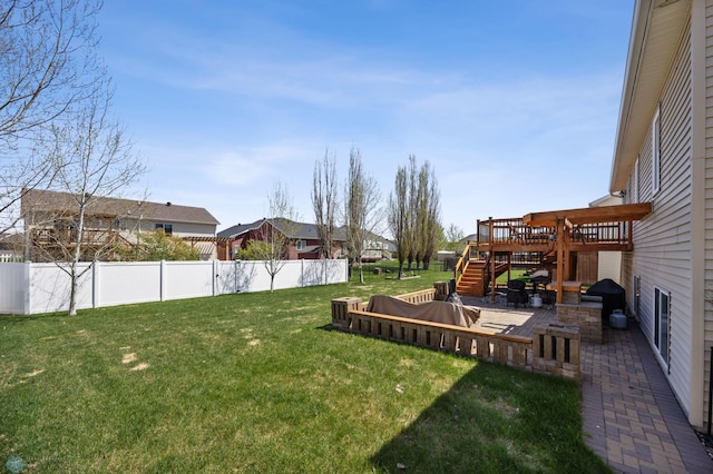 1623 10th St W, West Fargo, ND 58078 - view of yard featuring a deck, a patio area, a residential view, and stairs