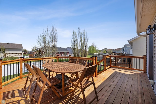 1623 10th St W, West Fargo, ND 58078 - deck with a residential view and outdoor dining space